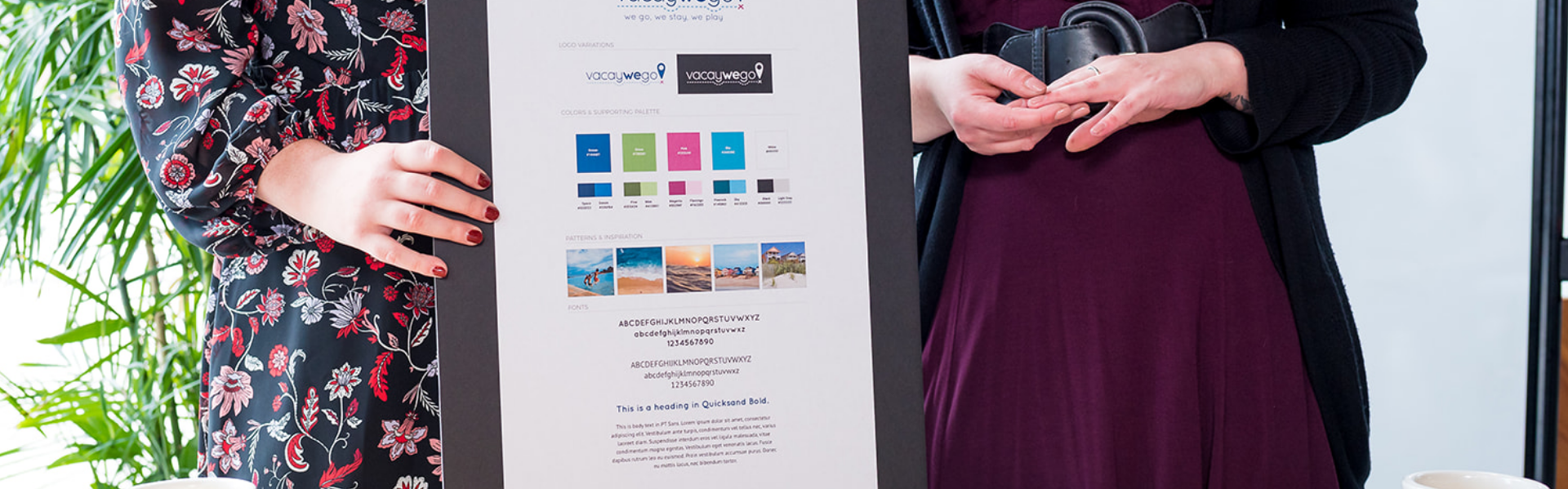 Hands holding a brand guide showing color usage, typography, and inspirational photography